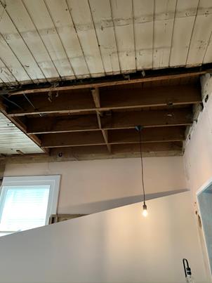 A picture containing indoor, building, ceiling, dirty

Description automatically generated